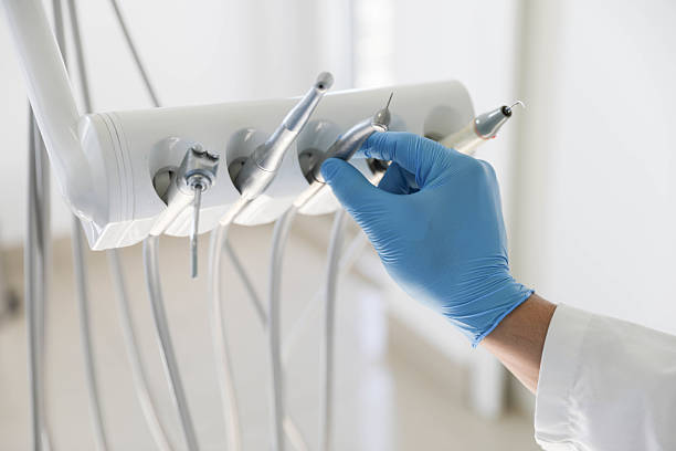 Professional Tooth Extraction technician working in Oskaloosa, KS